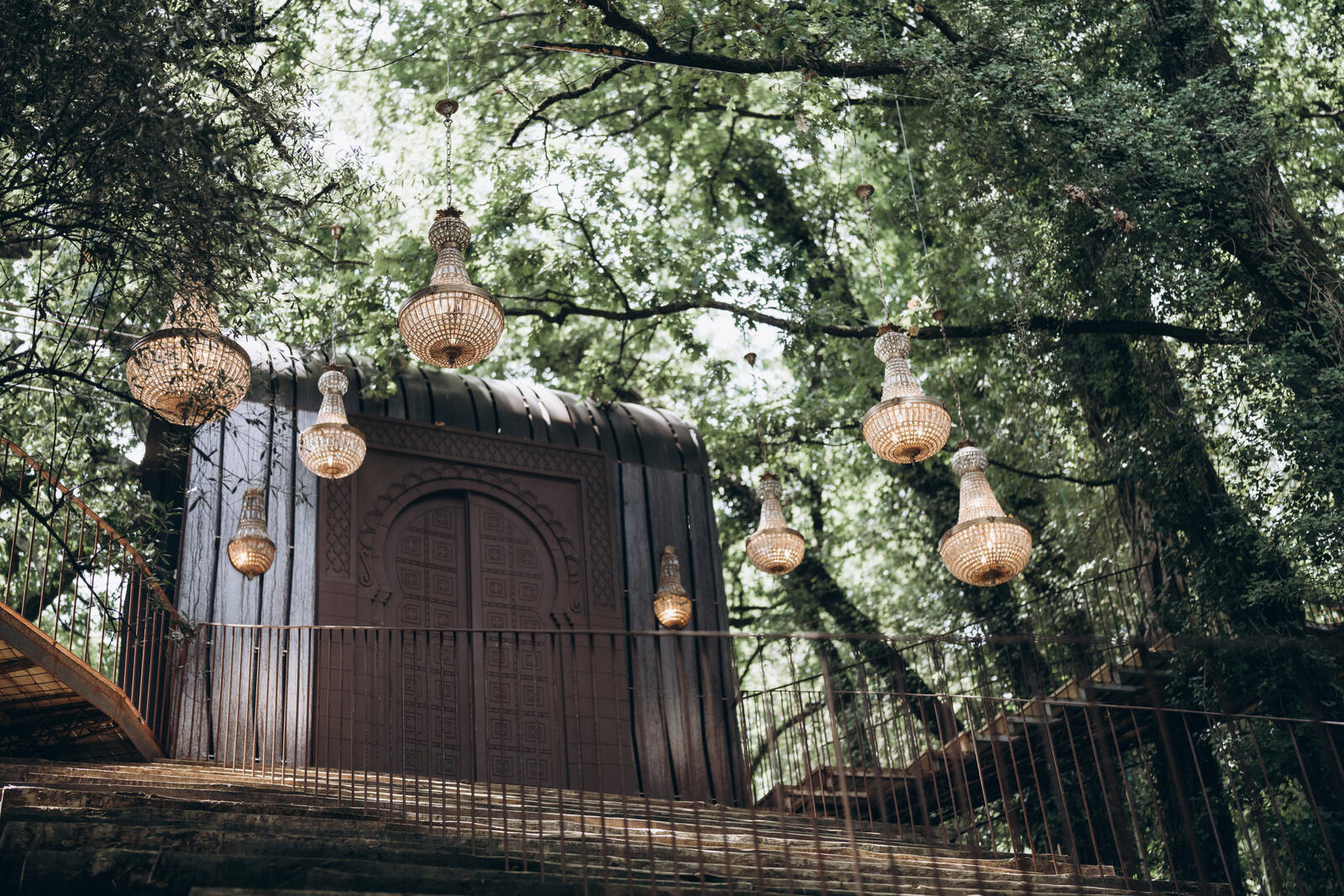 Sun-drenched Portuguese estate courtyard set for a destination wedding reception