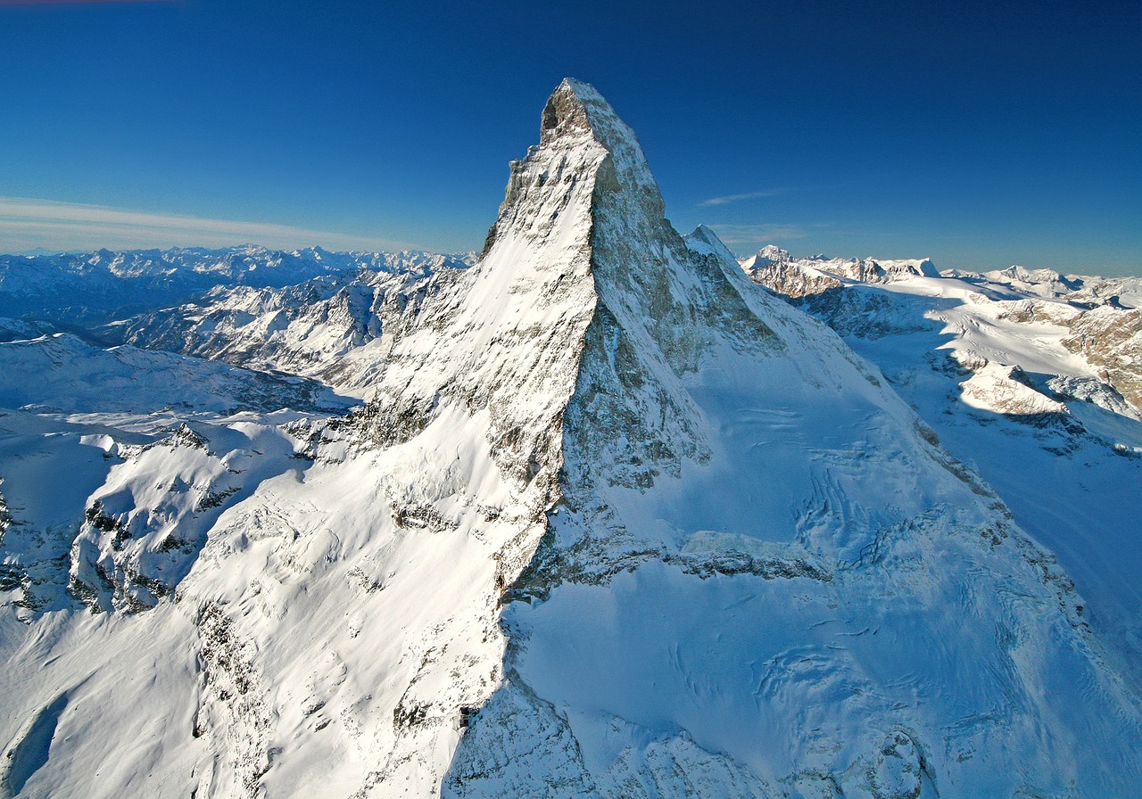 Swiss Alps peaks, lakes and mountain villages